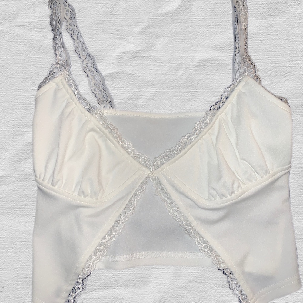 Boutique white split top.